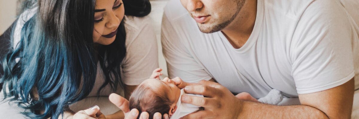 photo of people looking on child